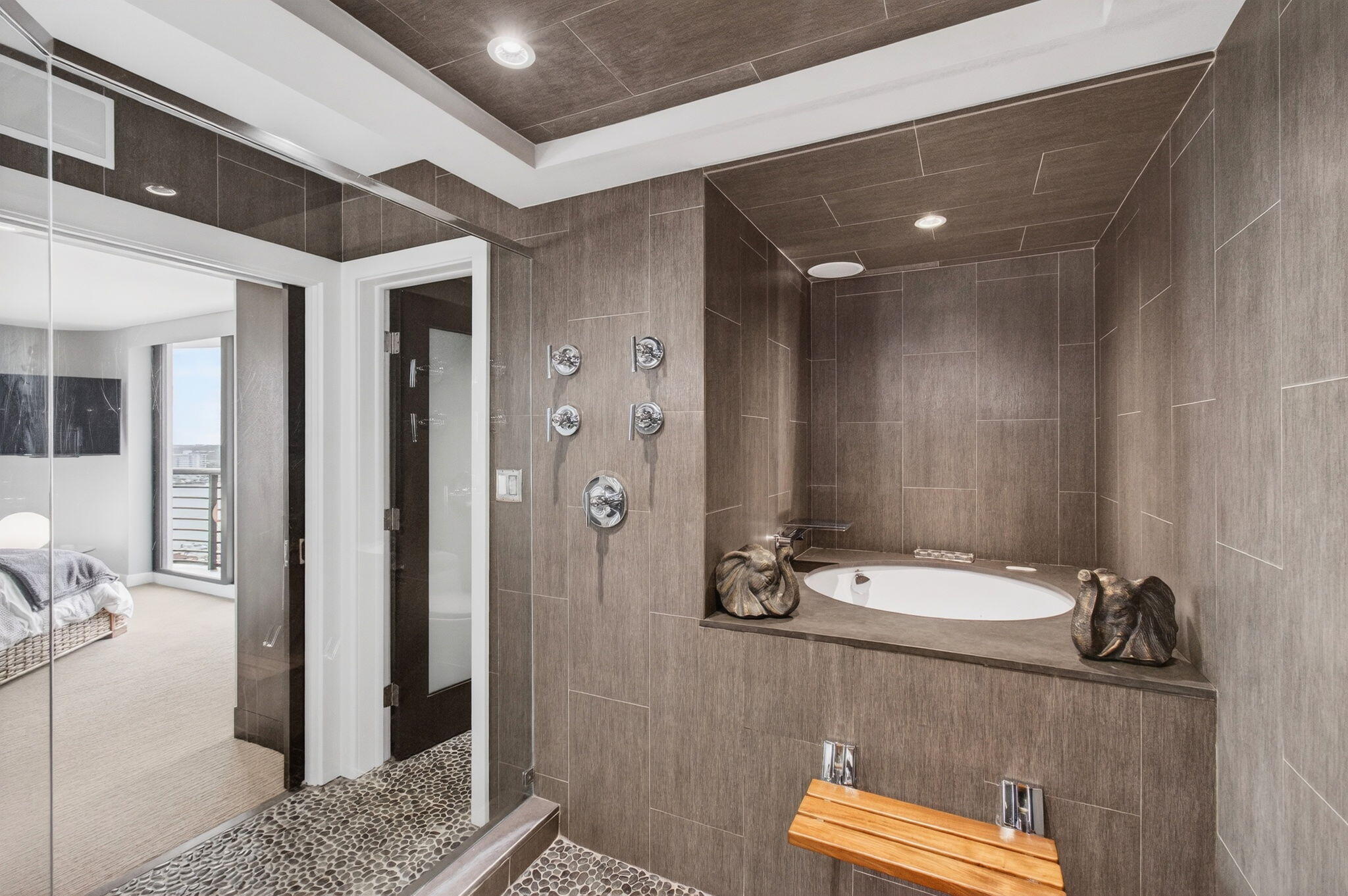 250 South Ocean Boulevard, Unit LPHA Boca Raton, FL 33432 - Photo 34 of 108 a bathroom with a sink and a mirror