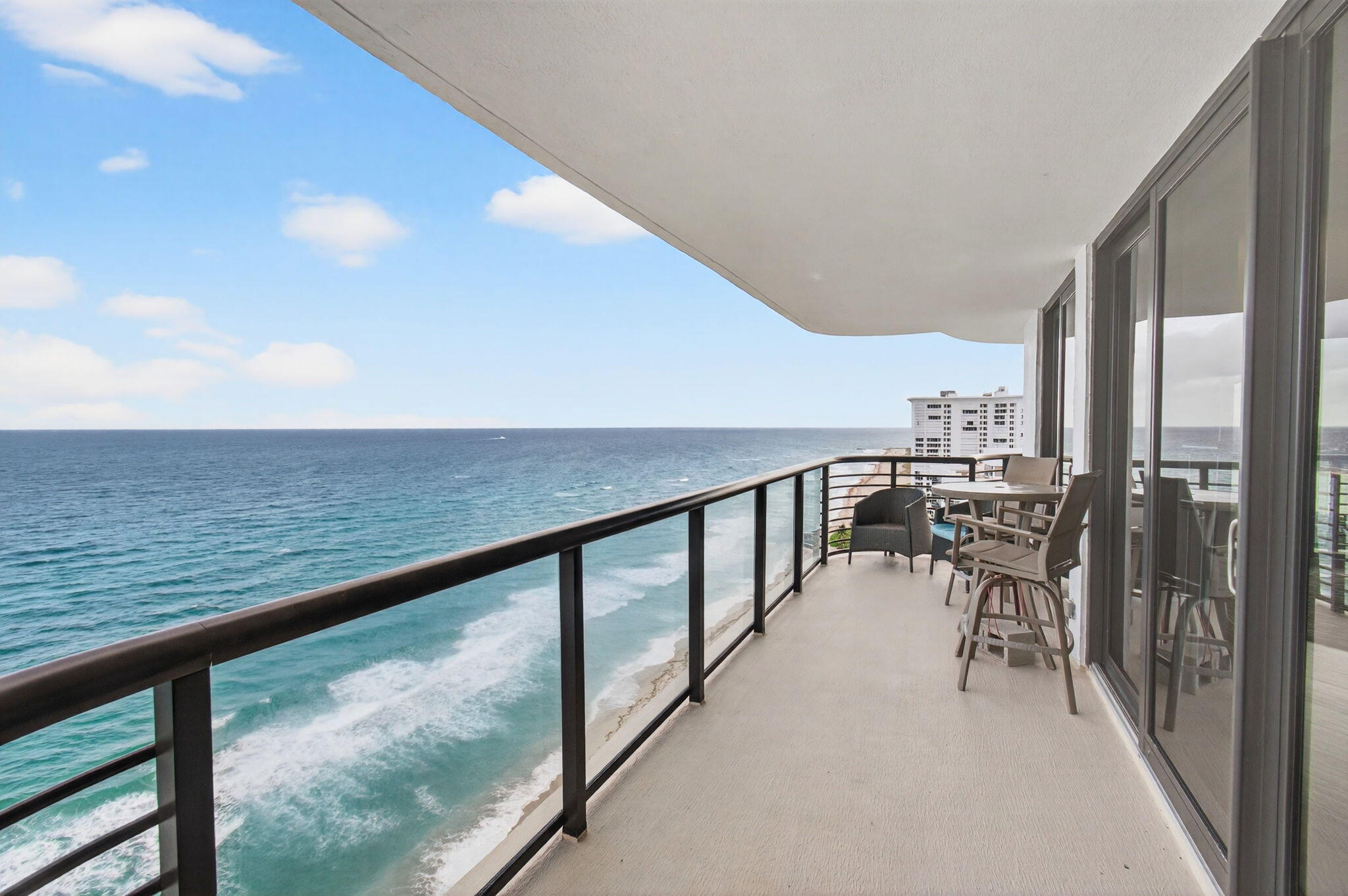 250 South Ocean Boulevard, Unit LPHA Boca Raton, FL 33432 - Photo 4 of 108 a view of a balcony with chairs