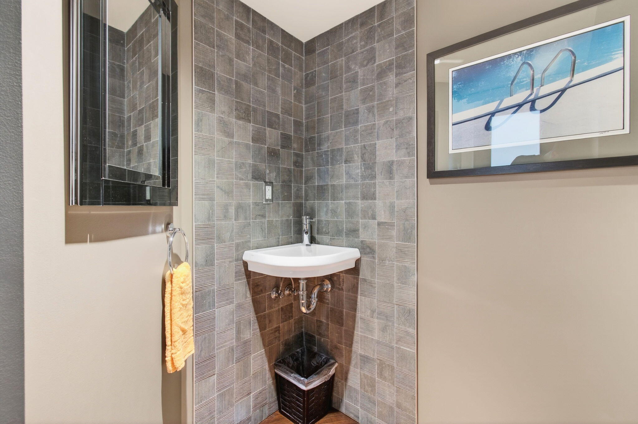 250 South Ocean Boulevard, Unit LPHA Boca Raton, FL 33432 - Photo 60 of 108 a bathroom with a sink a toilet and a mirror