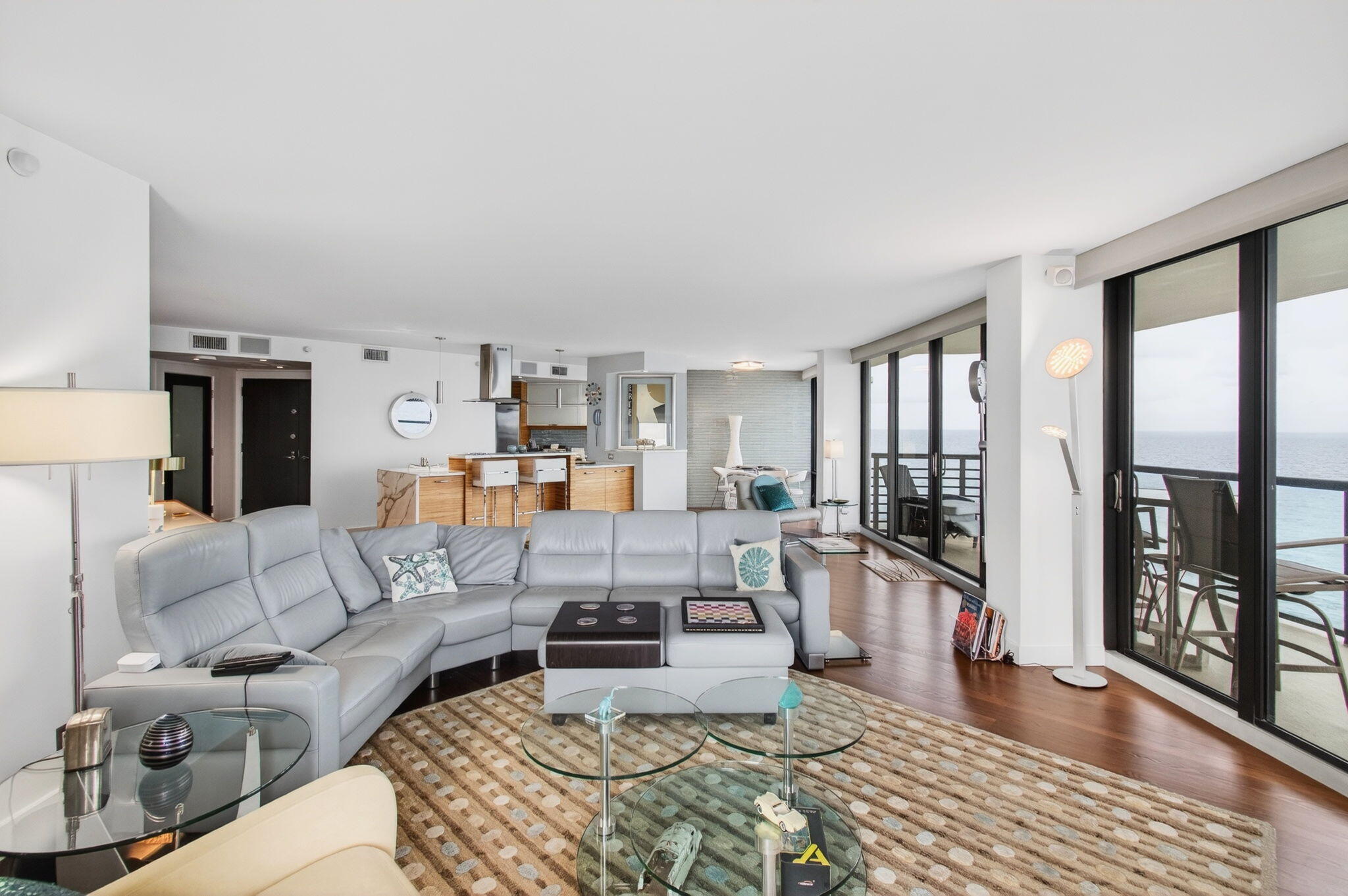 250 South Ocean Boulevard, Unit LPHA Boca Raton, FL 33432 - Photo 7 of 108 a living room with furniture and a table