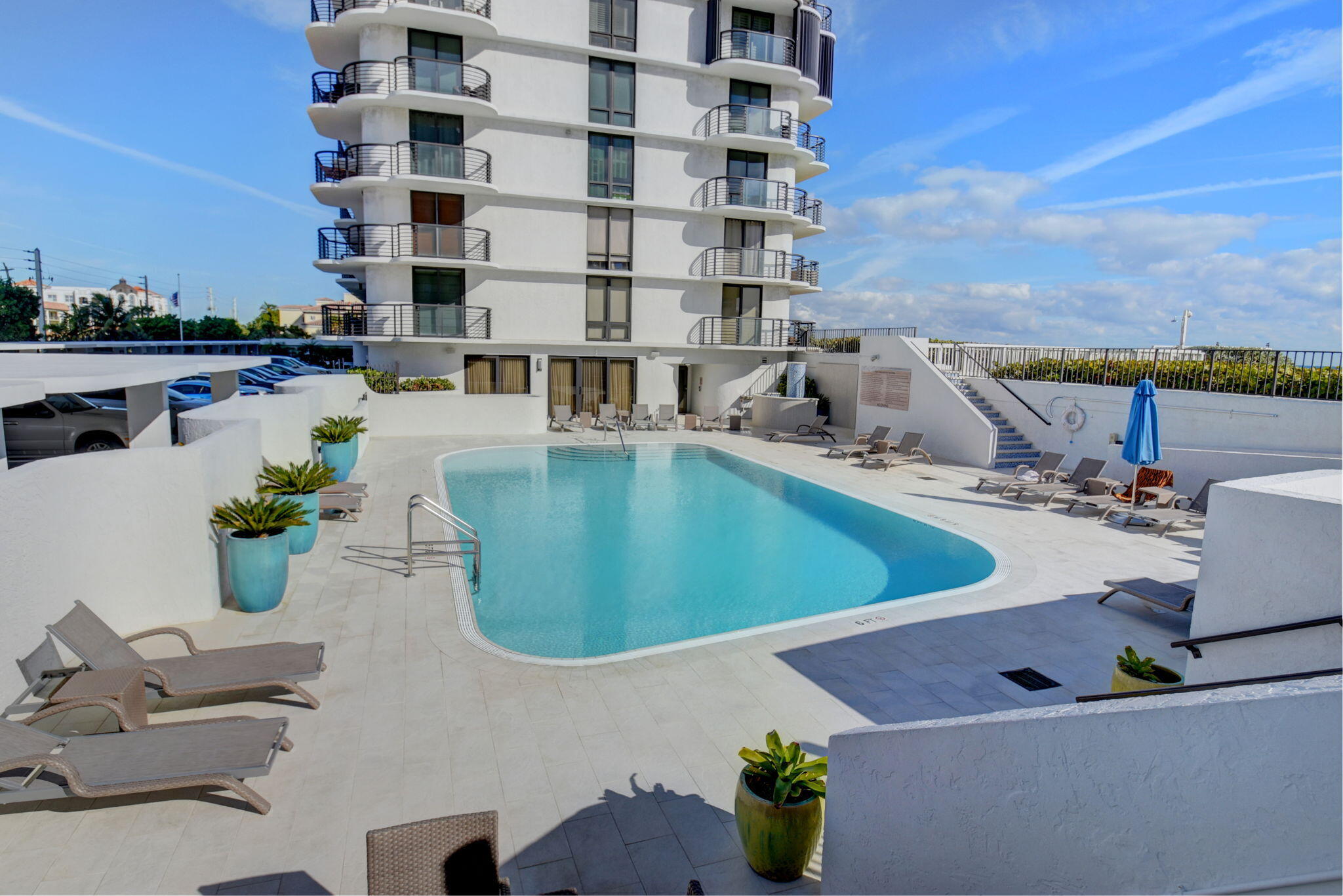 250 South Ocean Boulevard, Unit LPHA Boca Raton, FL 33432 - Photo 85 of 108 a view of a swimming pool with outdoor seating