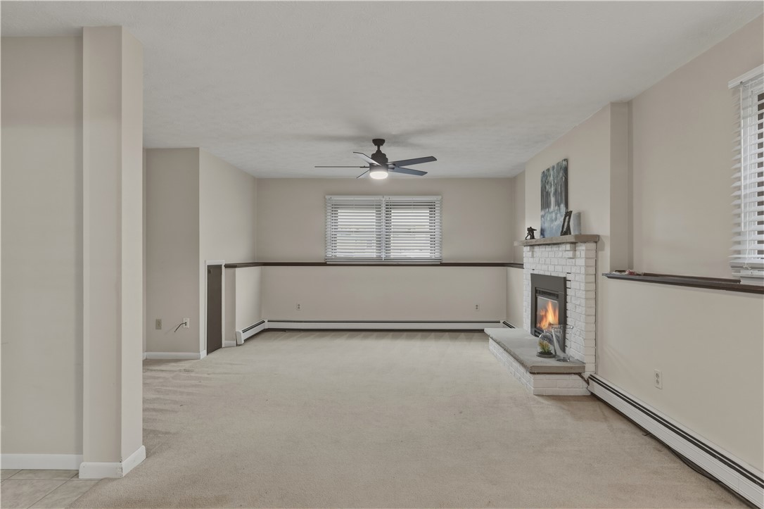 18 Groff Road Big Flats, NY 14845 - Photo 33 of 50 lower level family room with gas fireplace