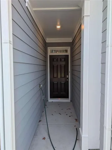 a bathroom with a tub shower and sink
