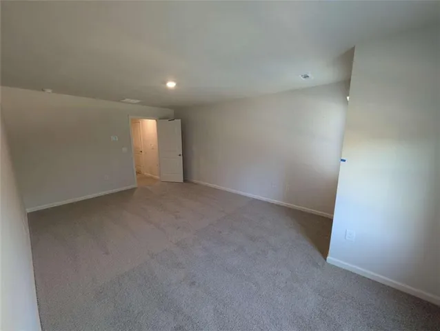 a bathroom with a double vanity sink toilet mirror and bathtub
