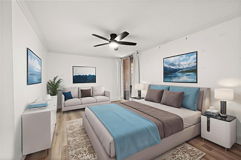 6979 Palm Court, Unit 104A Riverside, CA 92506 - Photo 22 of 53 a bedroom with a large bed and a chandelier