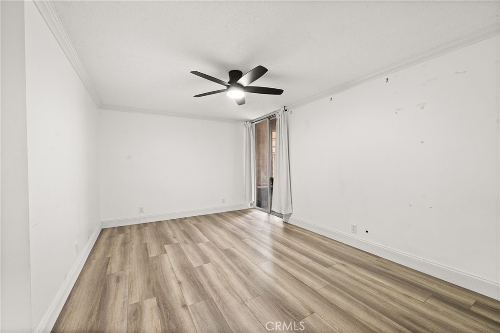 6979 Palm Court, Unit 104A Riverside, CA 92506 - Photo 23 of 53 wooden floor in an empty room