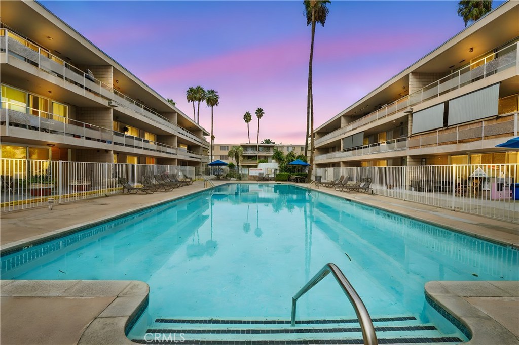 6979 Palm Court, Unit 104A Riverside, CA 92506 - Photo 3 of 53 a view of a swimming pool with outdoor seating