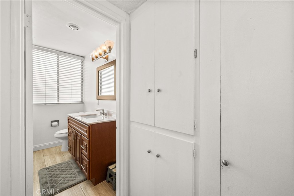 6979 Palm Court, Unit 104A Riverside, CA 92506 - Photo 32 of 53 a view of room with window and bathroom