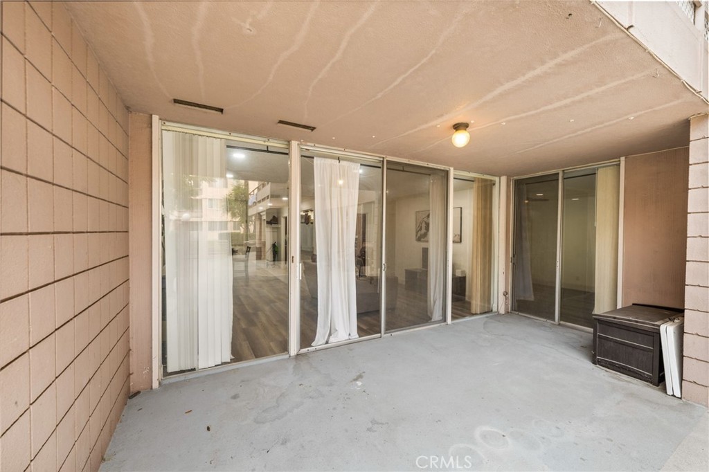 6979 Palm Court, Unit 104A Riverside, CA 92506 - Photo 37 of 53 a view of livingroom with hallway