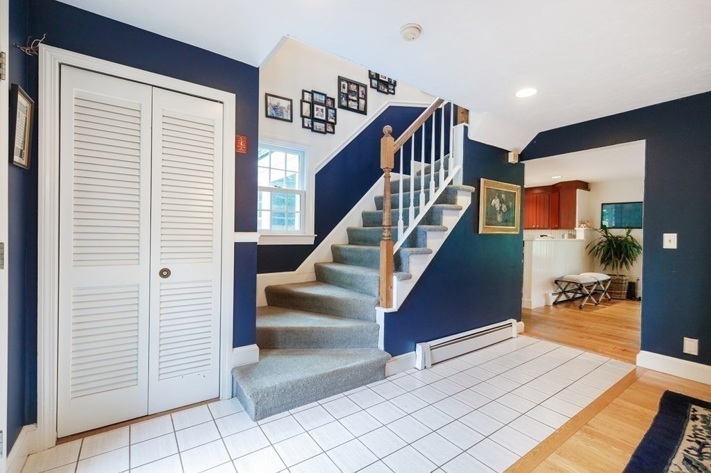 139 Fruit Street Hopkinton, MA 01748 - Photo 16 of 41 a view of entryway and hall with wooden floor
