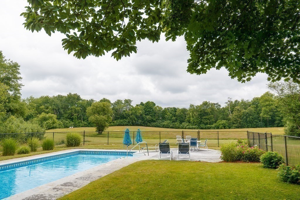 139 Fruit Street Hopkinton, MA 01748 - Photo 29 of 41 a view of a house with a yard