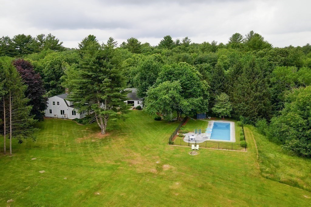 139 Fruit Street Hopkinton, MA 01748 - Photo 31 of 41 a view of a lake with a yard