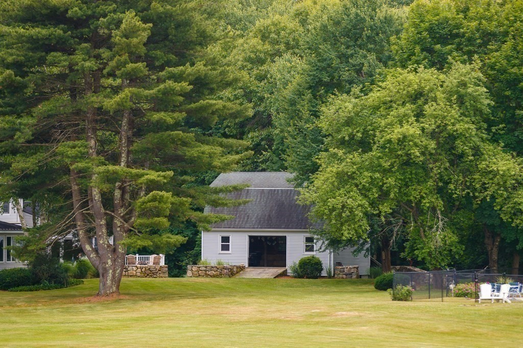 139 Fruit Street Hopkinton, MA 01748 - Photo 34 of 41 a front view of a house with a swimming pool