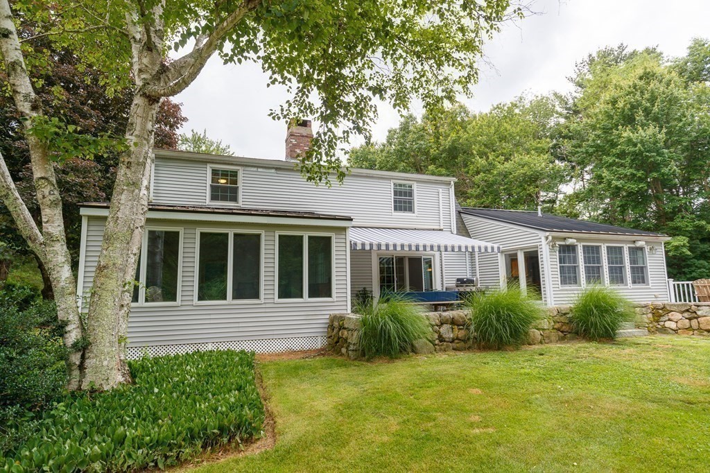 139 Fruit Street Hopkinton, MA 01748 - Photo 6 of 41 a view of a house with backyard and garden