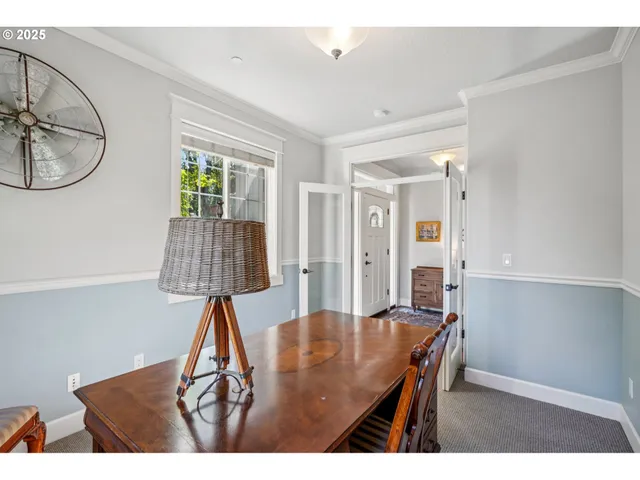 a open kitchen with sink and cabinets