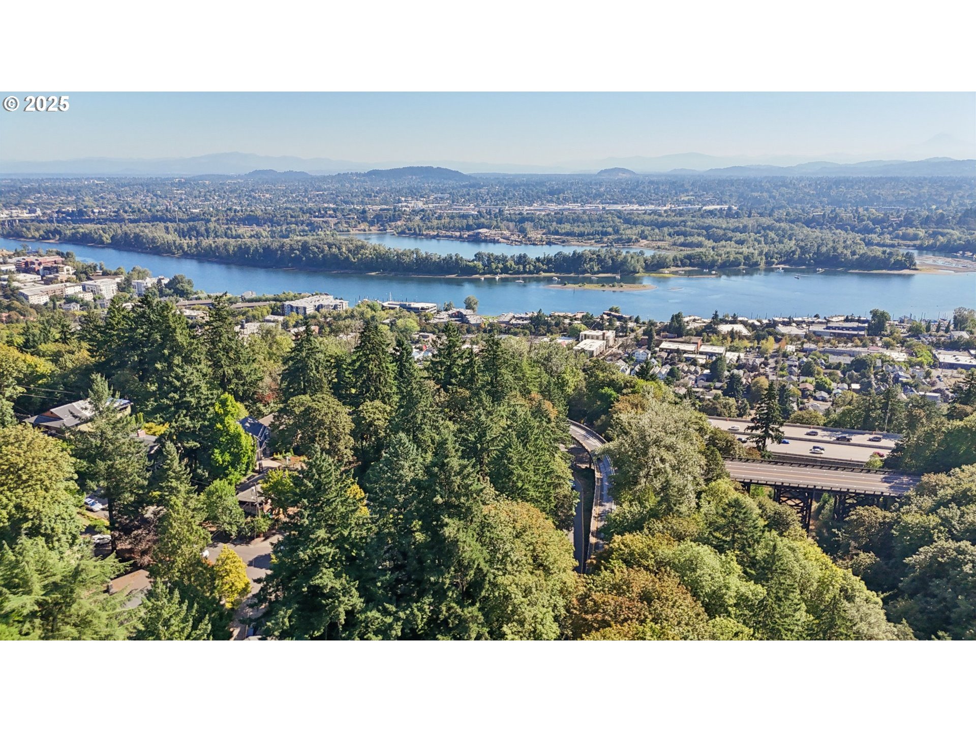 5862 Southwest Ralston Drive Portland, OR 97239 - Photo 2 of 41 a view of lake and mountain