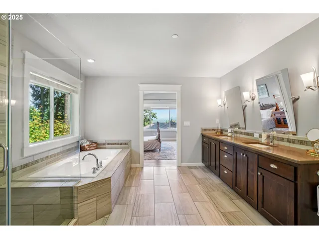 a bathroom with a bathtub and a sink