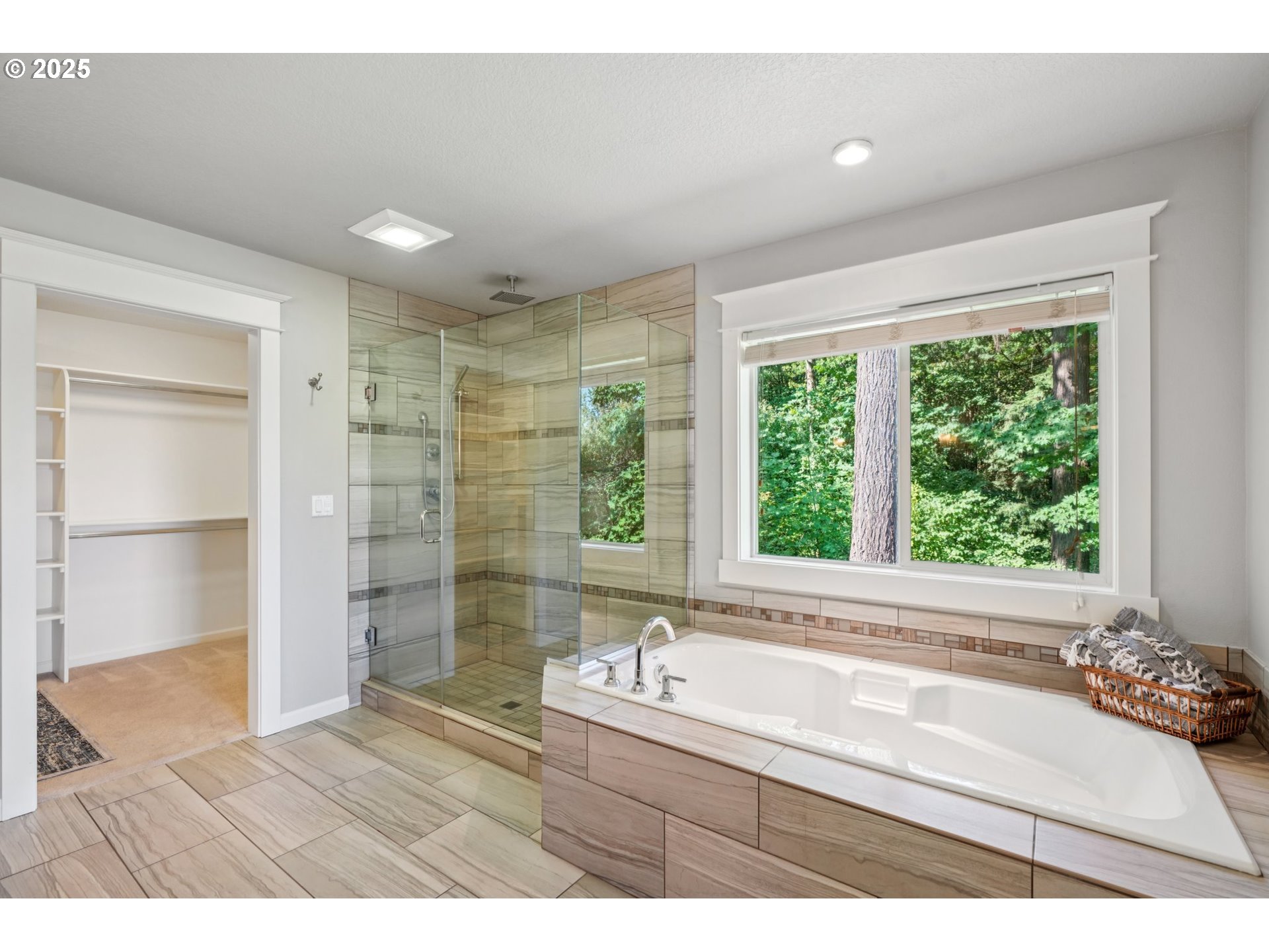 5862 Southwest Ralston Drive Portland, OR 97239 - Photo 24 of 41 a bathroom with a bathtub and a sink