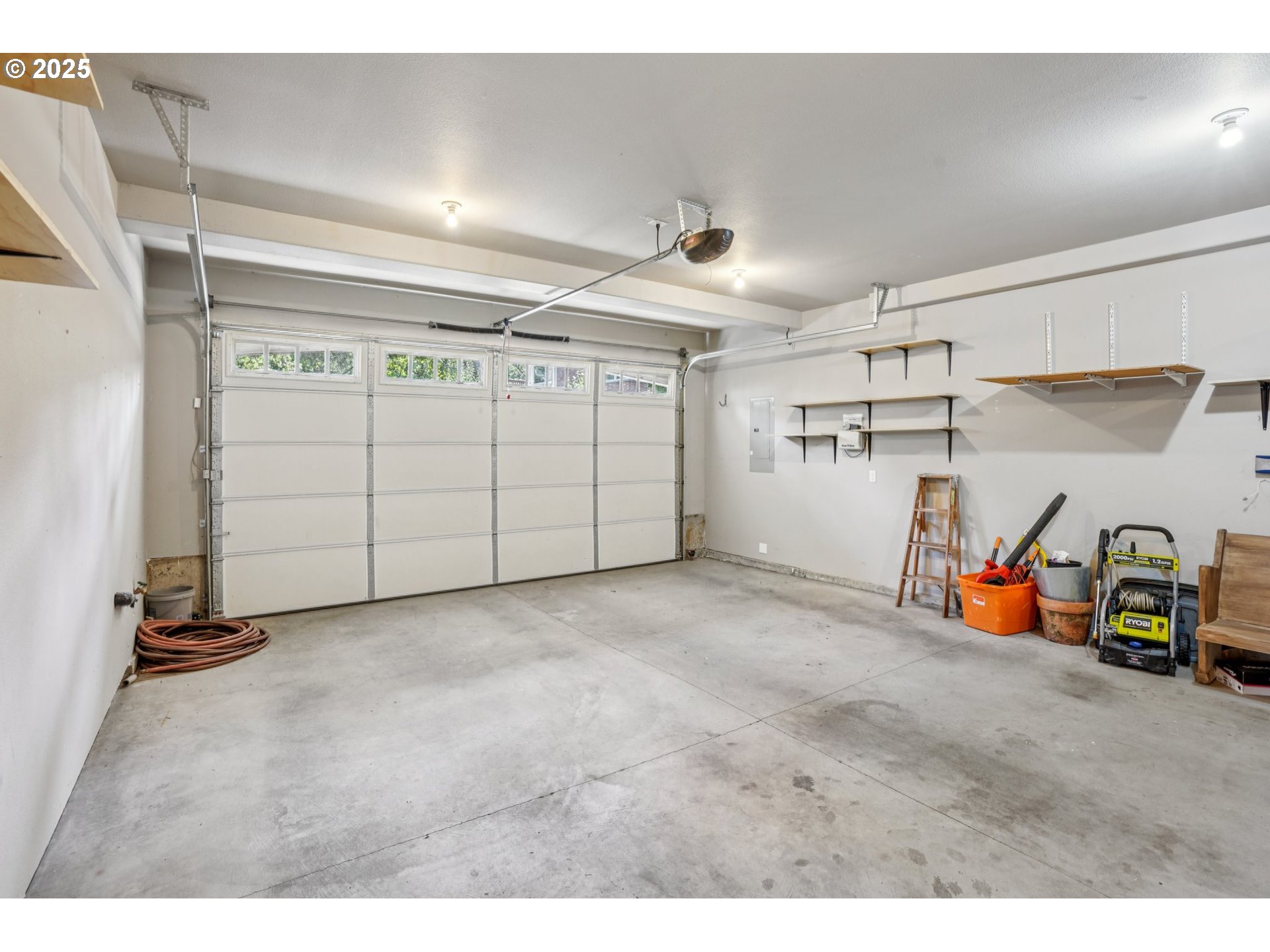5862 Southwest Ralston Drive Portland, OR 97239 - Photo 32 of 41 a view of a garage