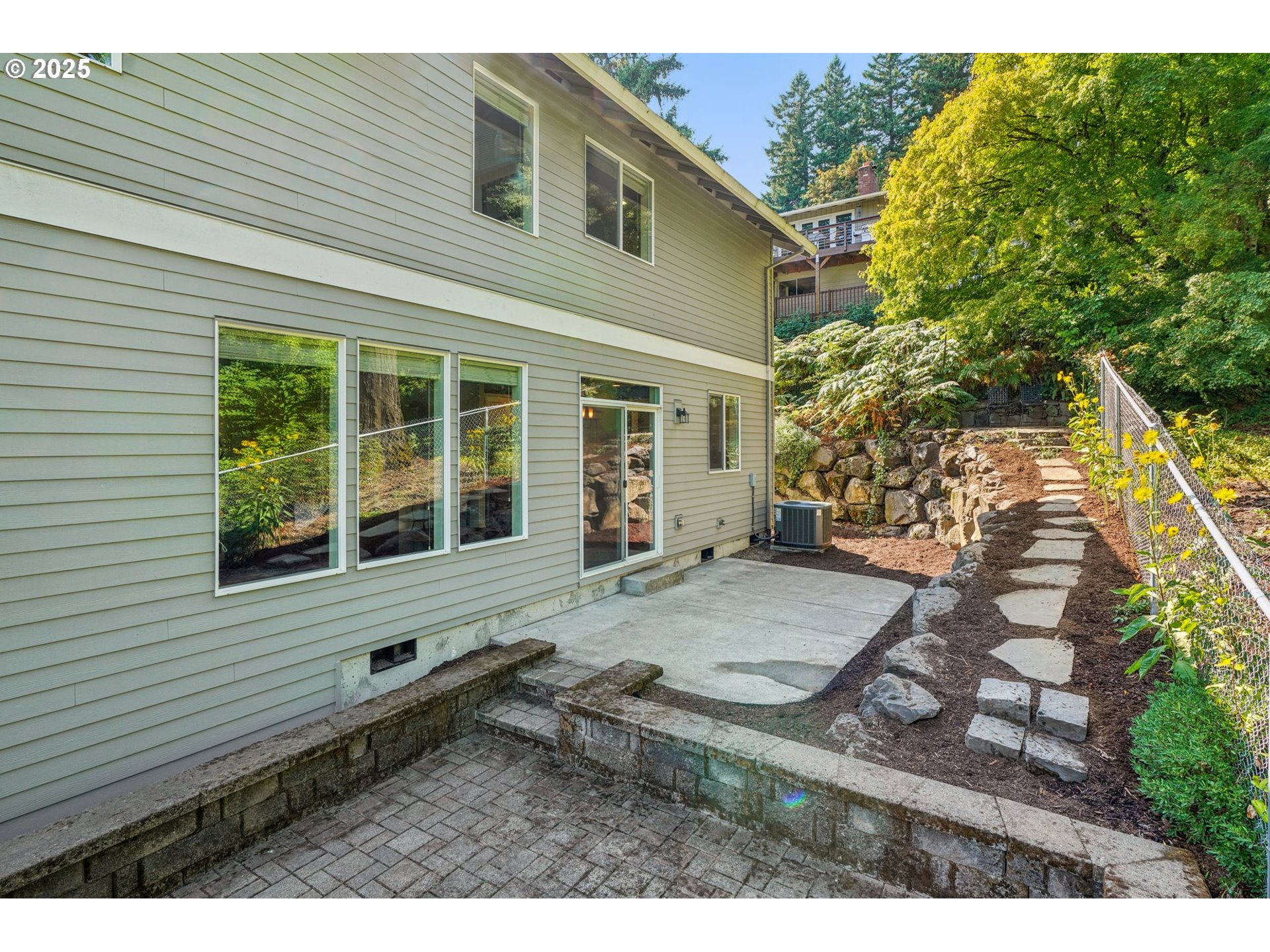 5862 Southwest Ralston Drive Portland, OR 97239 - Photo 33 of 41 a view of house with backyard
