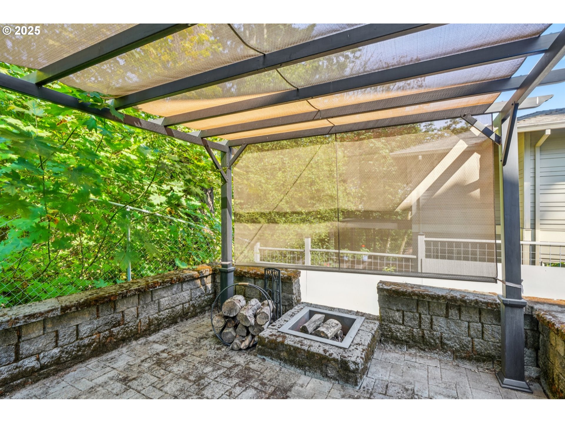 5862 Southwest Ralston Drive Portland, OR 97239 - Photo 35 of 41 a living room view with a floor to ceiling window and wooden floor