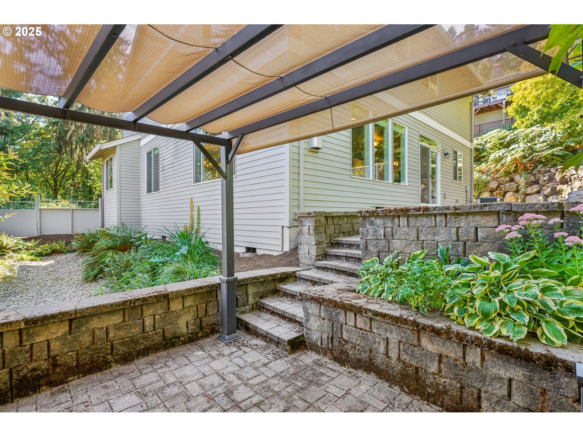 5862 Southwest Ralston Drive Portland, OR 97239 - Photo 36 of 41 a house view with a garden space