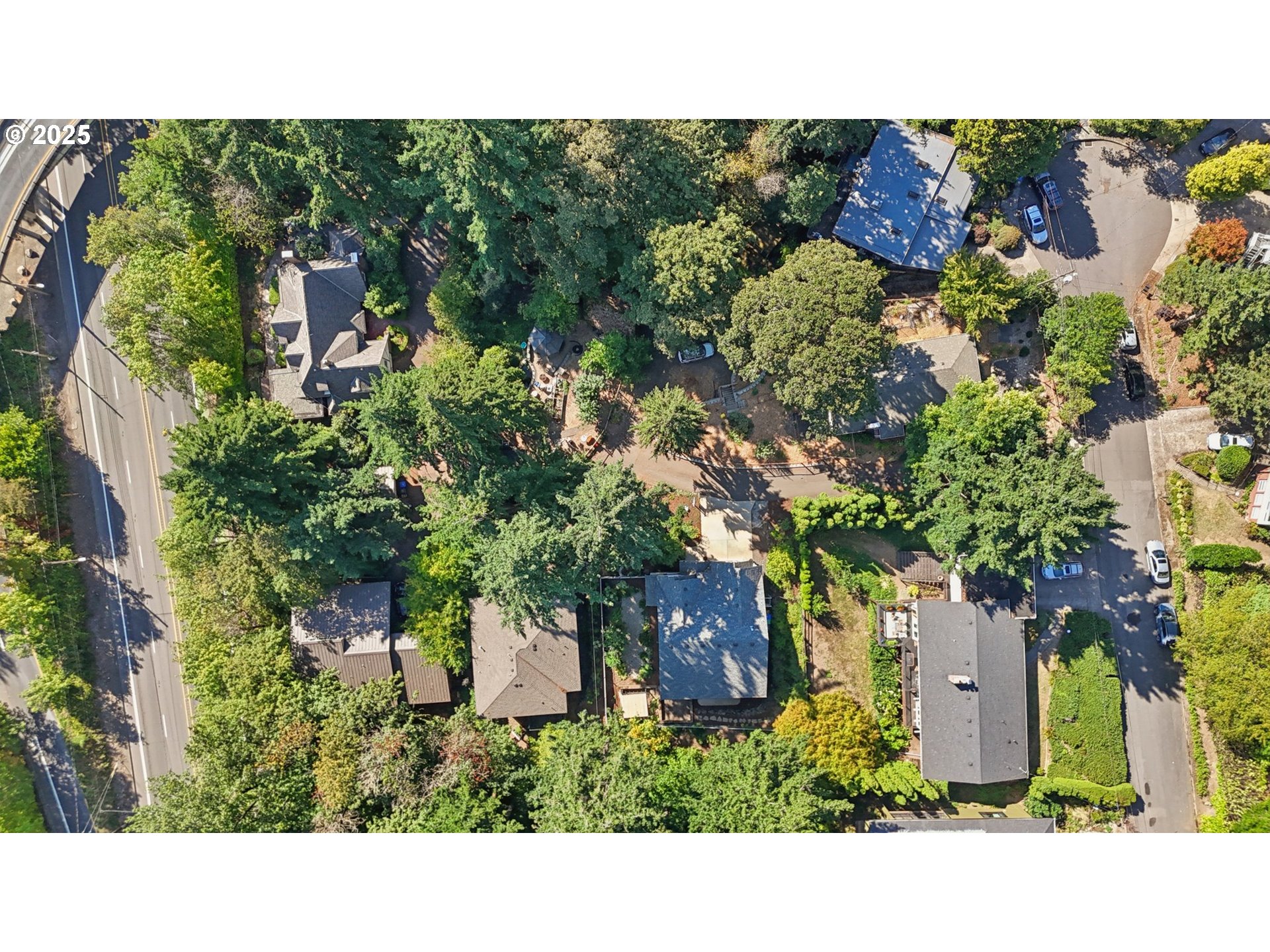 5862 Southwest Ralston Drive Portland, OR 97239 - Photo 38 of 41 a black and white photo of a house