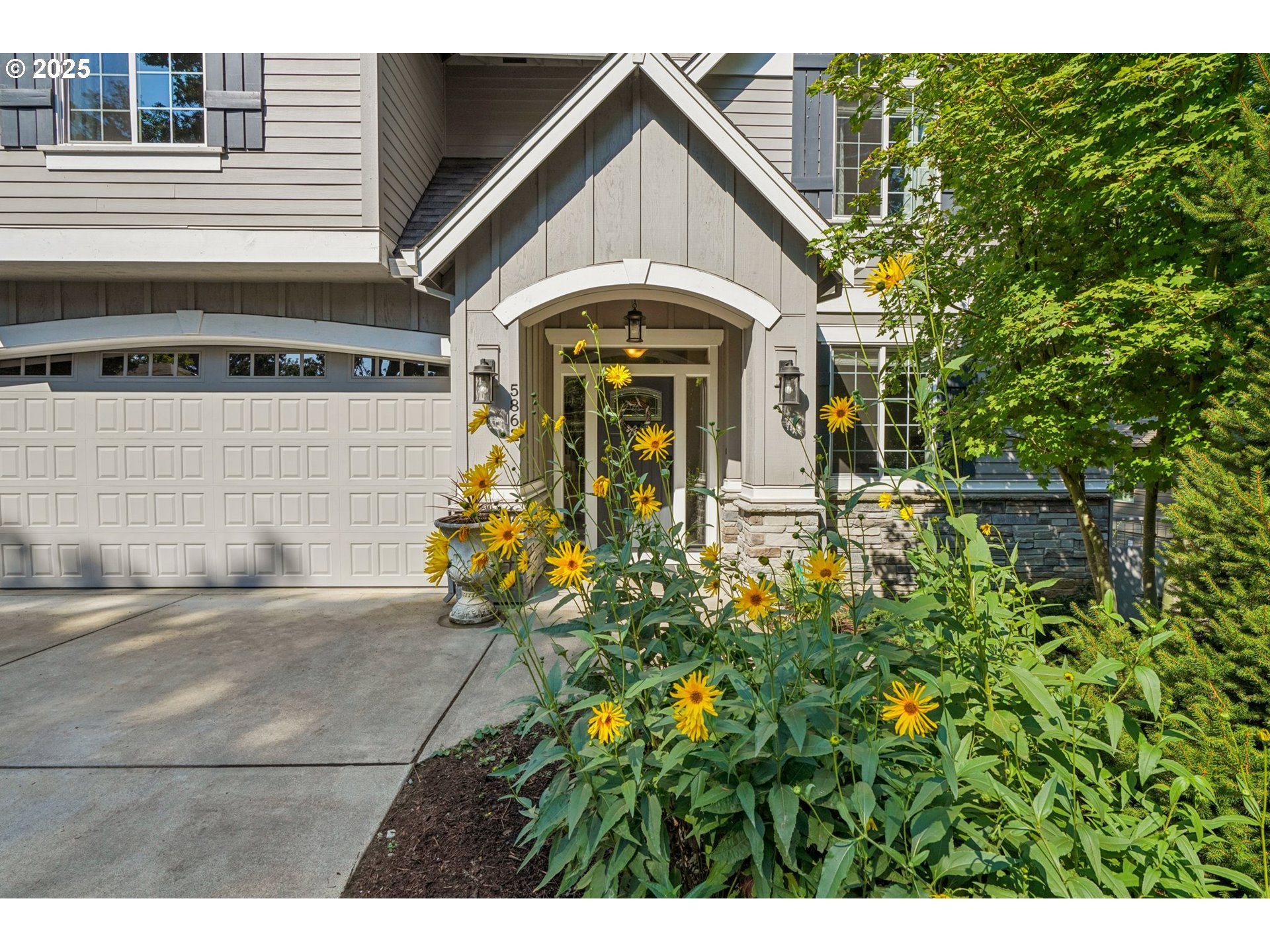 5862 Southwest Ralston Drive Portland, OR 97239 - Photo 4 of 41 a front view of a house