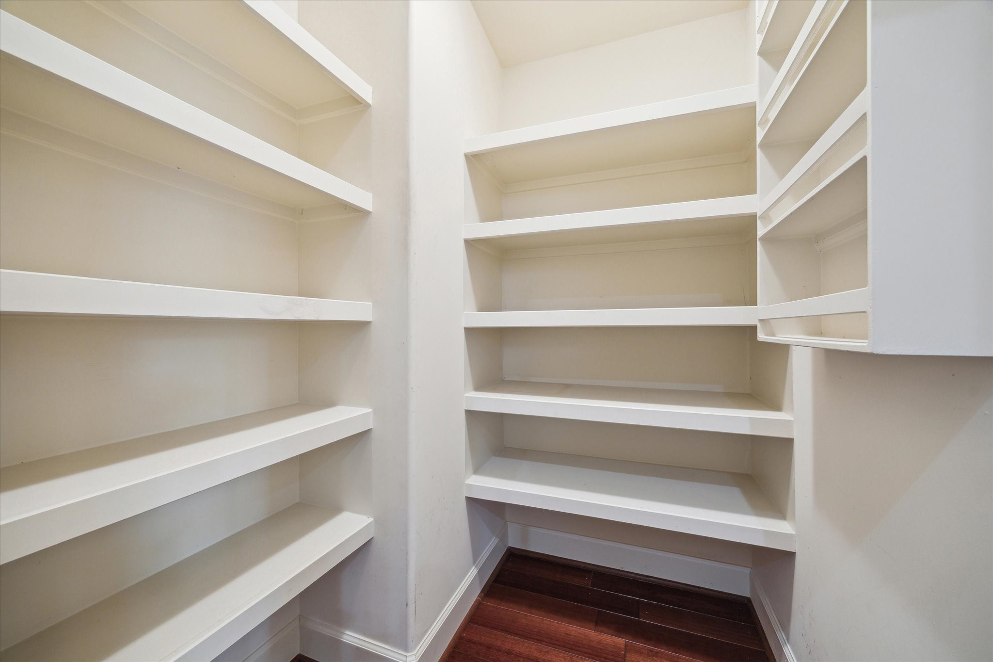 415 Tuam Street Houston, TX 77006 - Photo 11 of 21 a view of room with storage and racks on wall