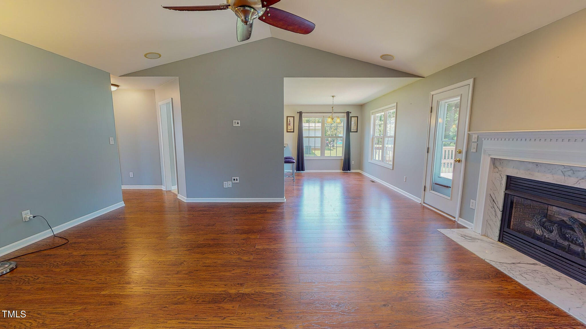 128 Punch Hill Farm Road Rougemont, NC 27572 - Photo 12 of 45 a view of an empty room with window and wooden floor