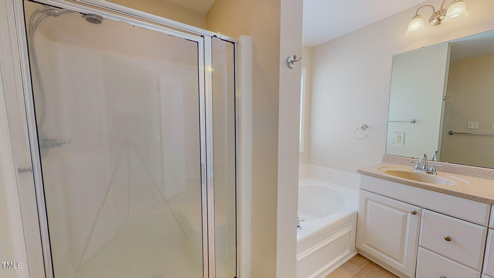 128 Punch Hill Farm Road Rougemont, NC 27572 - Photo 29 of 45 a bathroom with a granite countertop sink and a mirror