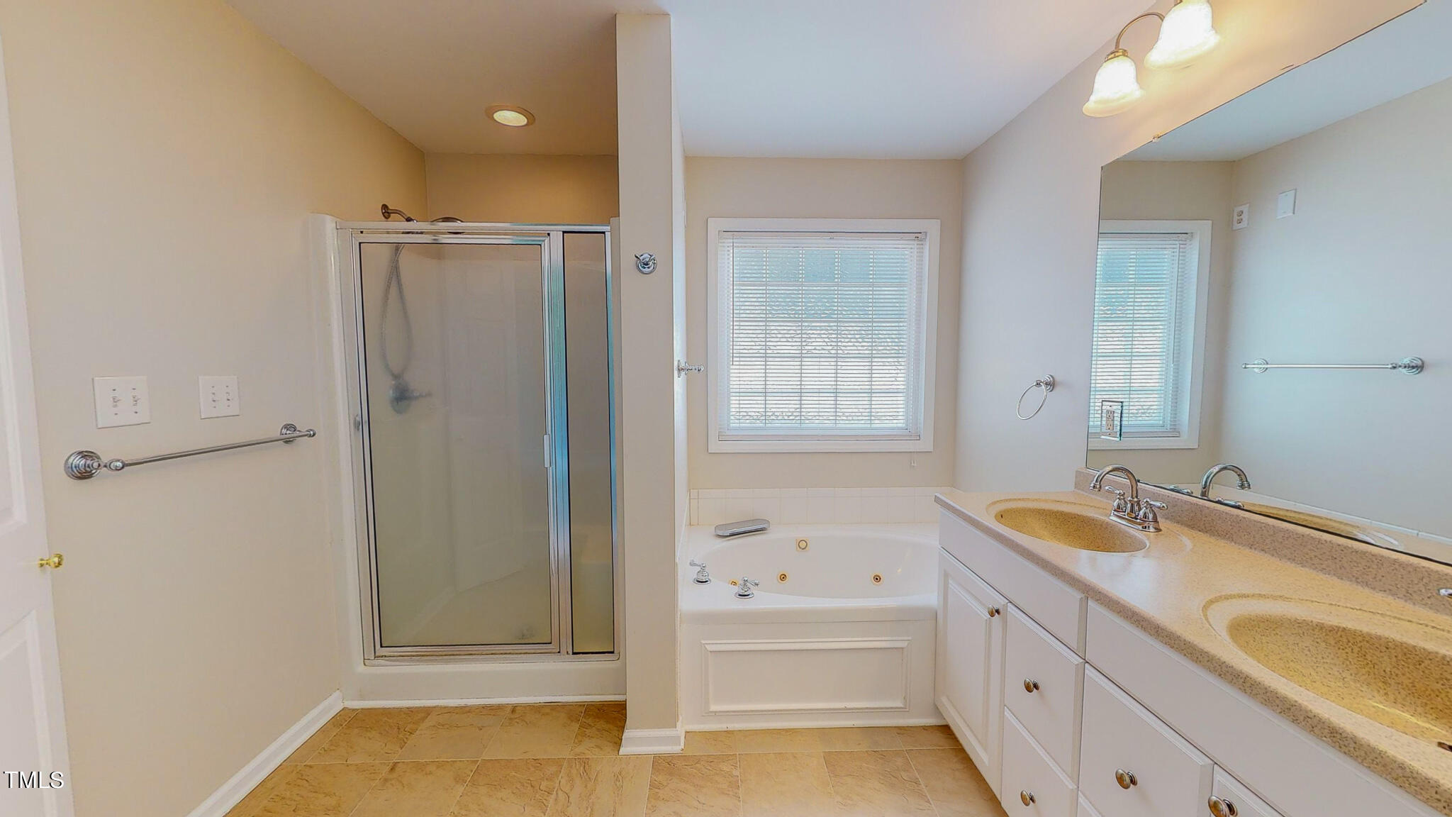 128 Punch Hill Farm Road Rougemont, NC 27572 - Photo 30 of 45 a bathroom with a tub sink and mirror