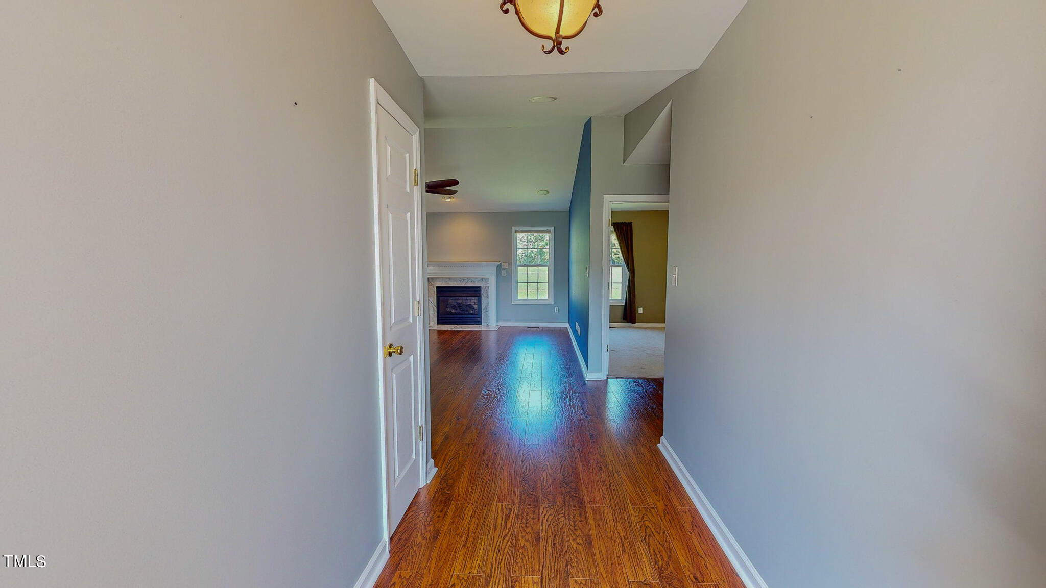 128 Punch Hill Farm Road Rougemont, NC 27572 - Photo 44 of 45 a view of a hallway with wooden floor