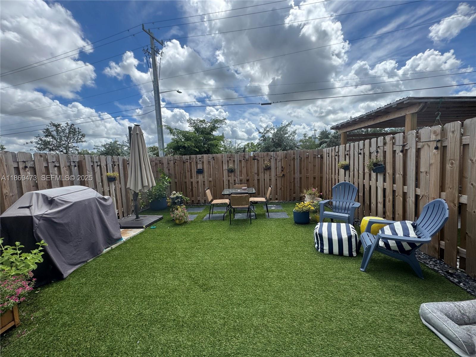 16270 Southwest 293rd Street Homestead, FL 33033 - Photo 13 of 13 a view of backyard with swimming pool and furniture