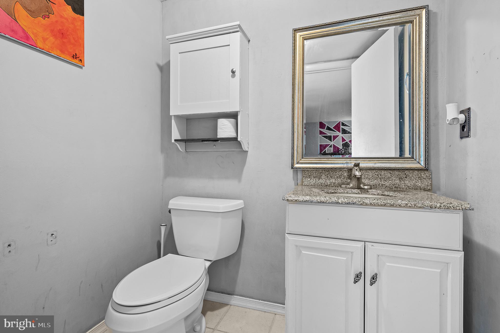 20 Westbridge Road Bear, DE 19701 - Photo 20 of 24 Powder room is easy to access on the main level.