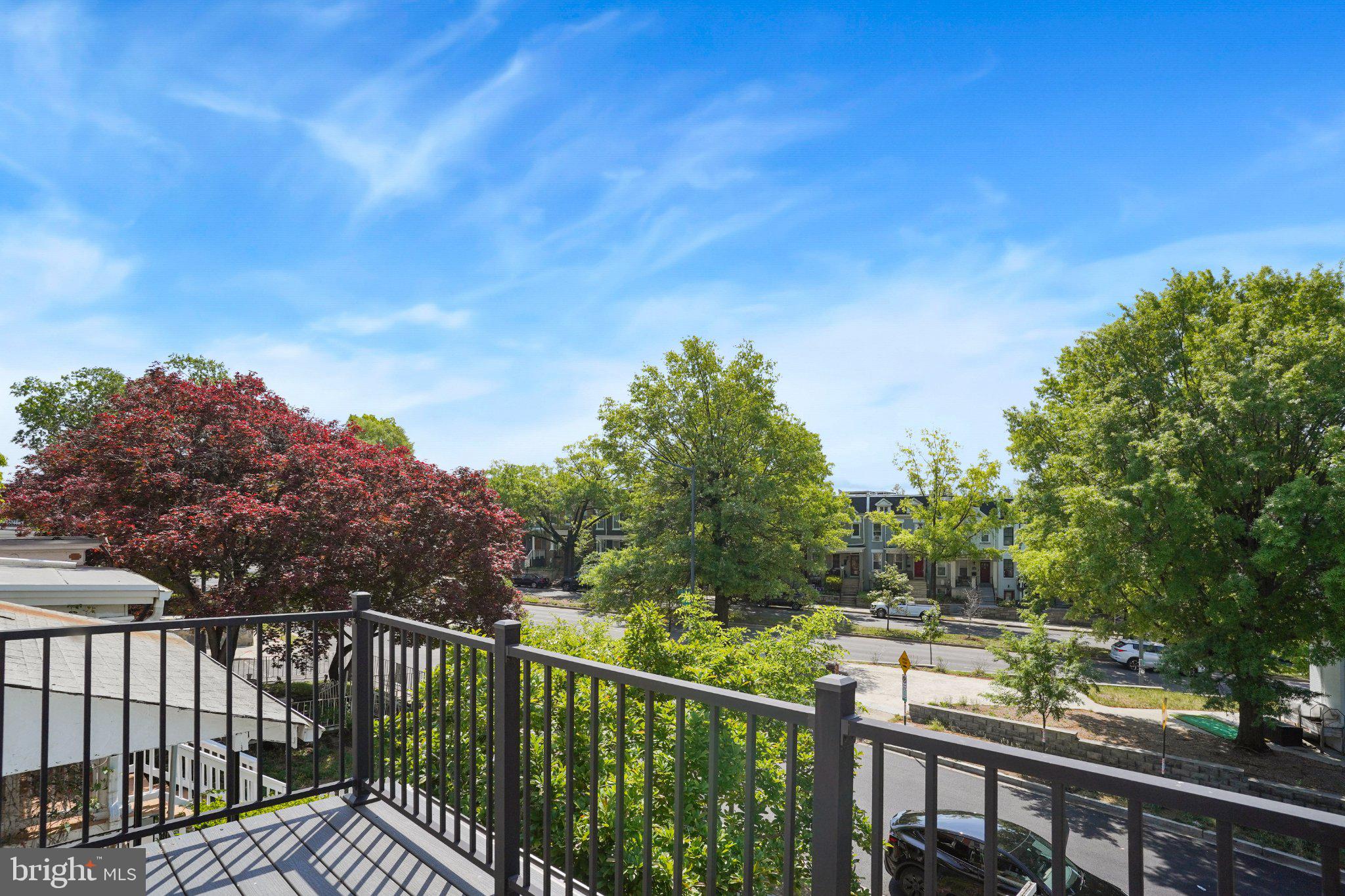 112 V Street Northeast Washington, DC 20002 - Photo 23 of 25 a view of a balcony with wooden fence