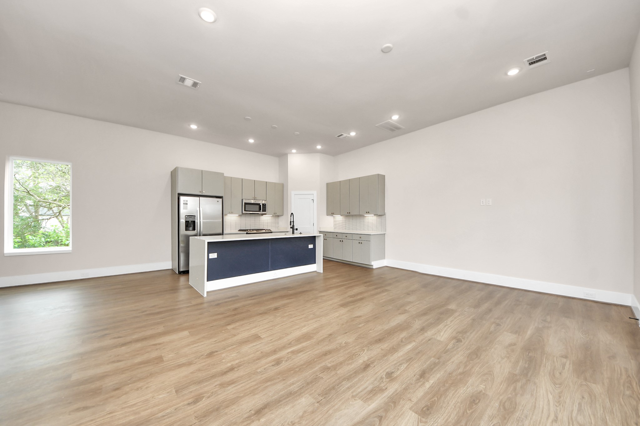 783 Mansfield Street Houston, TX 77091 - Photo 15 of 40 a view of kitchen with wooden floor