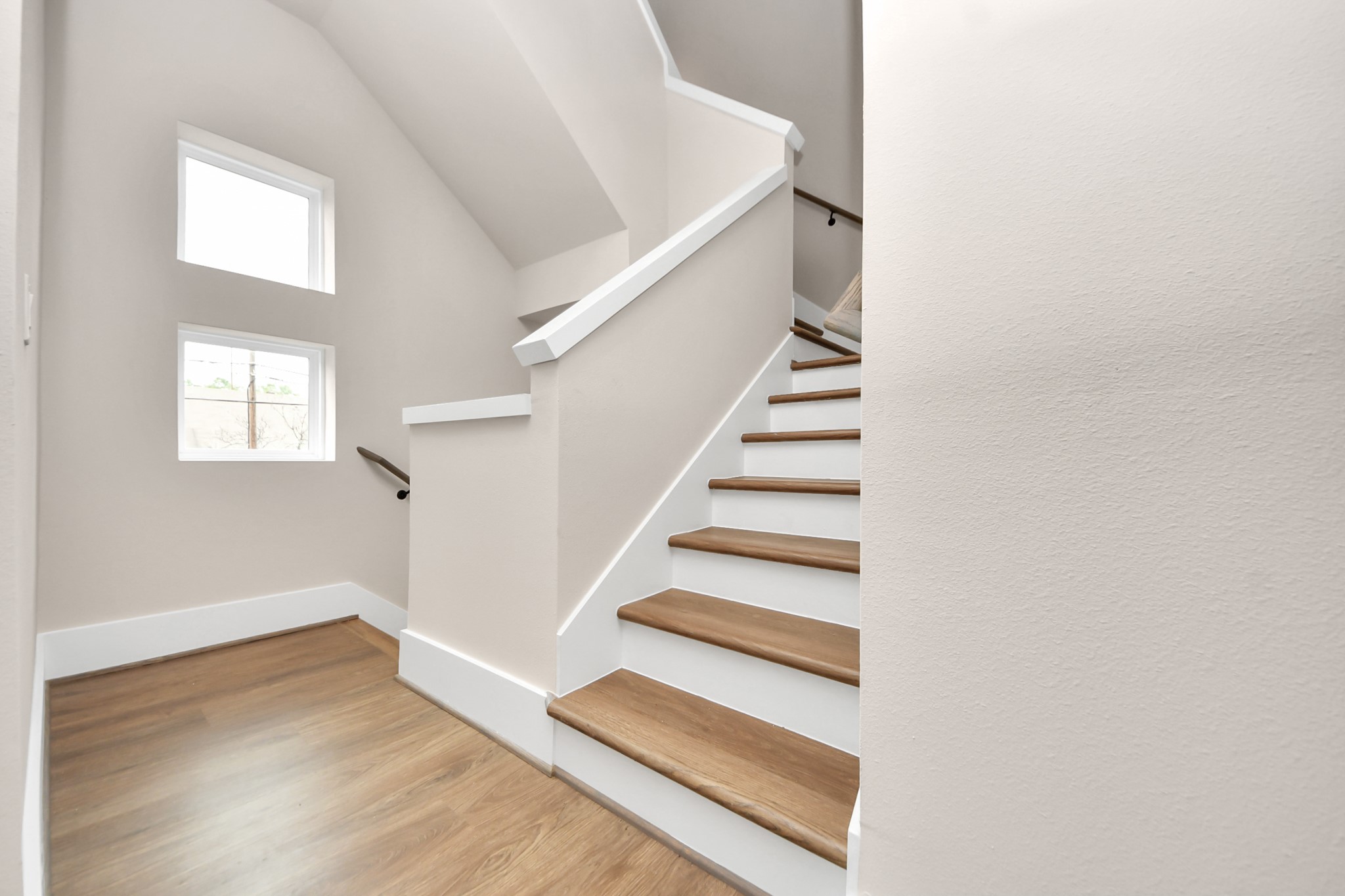 783 Mansfield Street Houston, TX 77091 - Photo 8 of 40 a view of entryway and hall with wooden floor