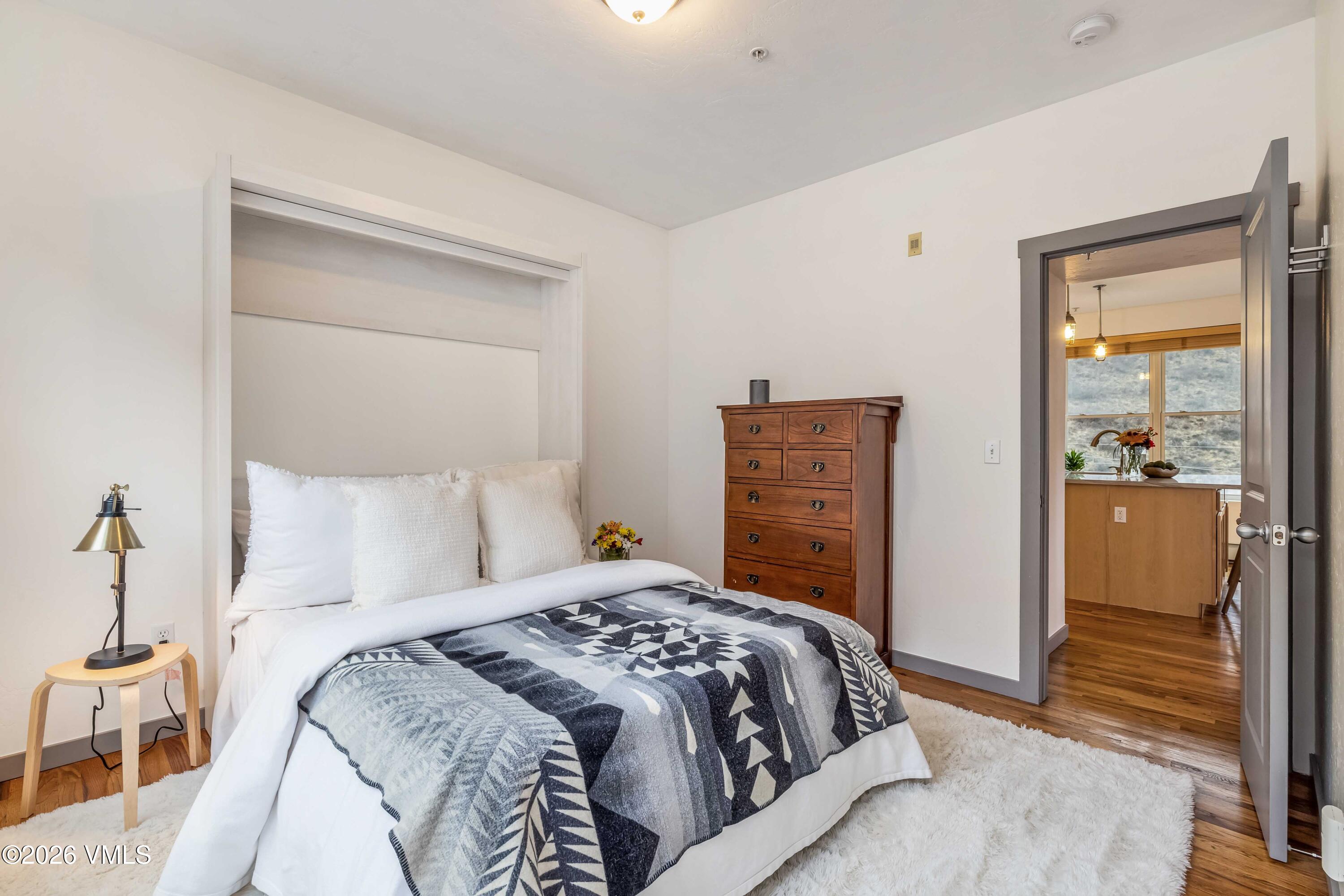 491 Metcalf Road, Unit A2 Avon, CO 81620 - Photo 14 of 23 a bedroom with a bed and a closet