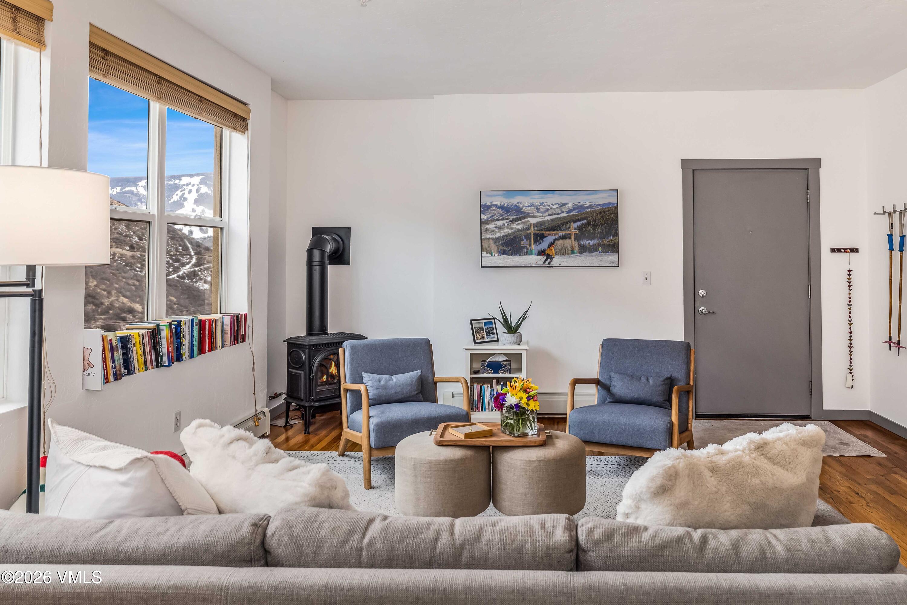 491 Metcalf Road, Unit A2 Avon, CO 81620 - Photo 17 of 23 a living room with furniture and a window