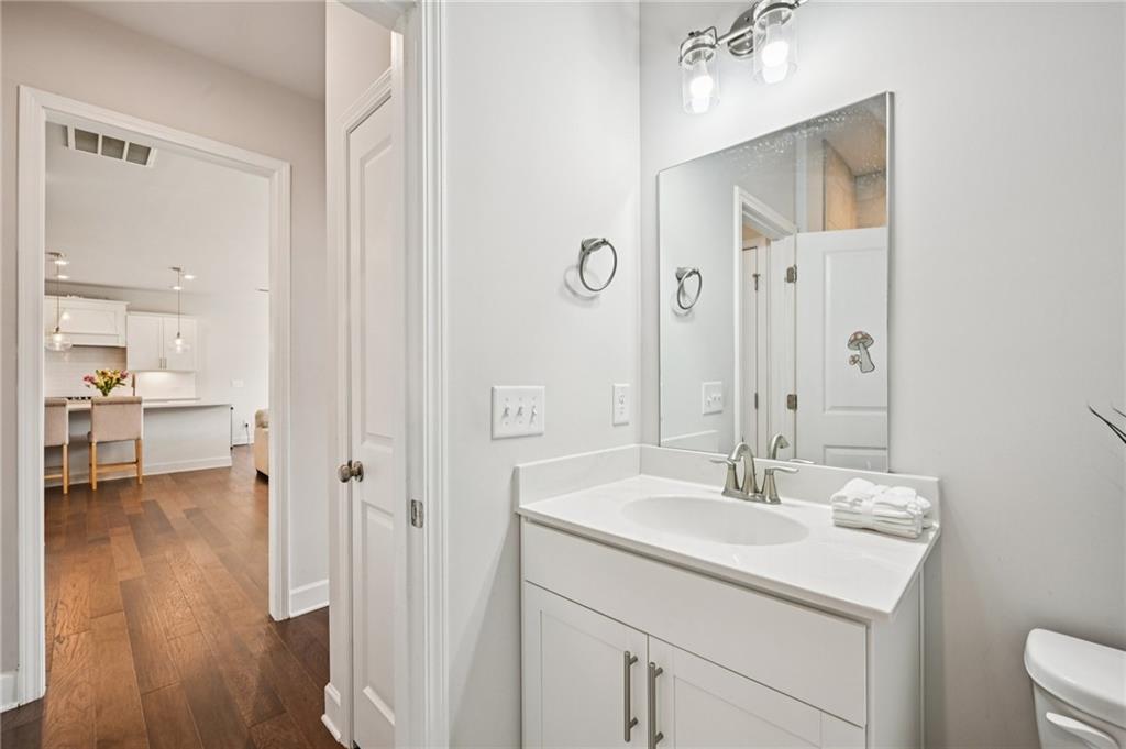 1283 Maston Road Auburn, GA 30011 - Photo 30 of 82 a bathroom with a sink a toilet and shower