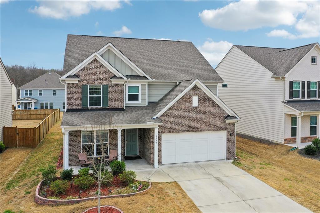 1283 Maston Road Auburn, GA 30011 - Photo 70 of 82 a front view of a house with garden