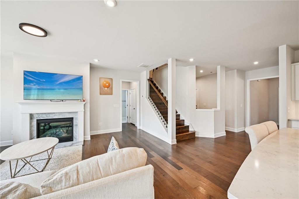 1283 Maston Road Auburn, GA 30011 - Photo 8 of 82 a living room with furniture and a fireplace