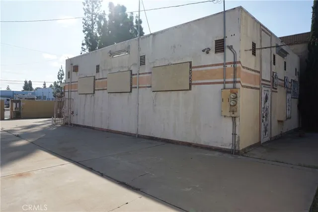 a view of a street with a building