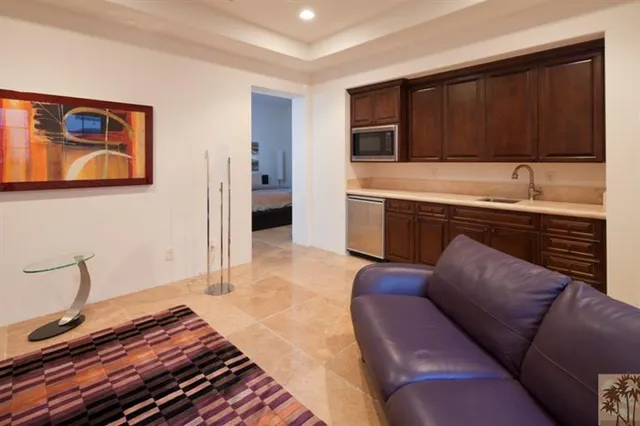 a view of a swimming pool with lounge chair