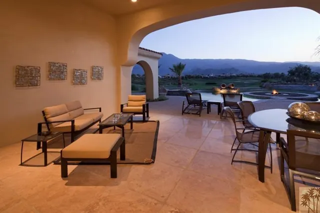 a view of a house with swimming pool