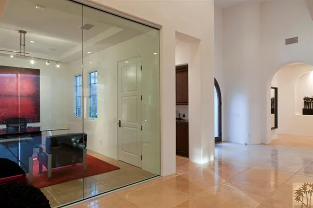 a room with furniture and wooden floor