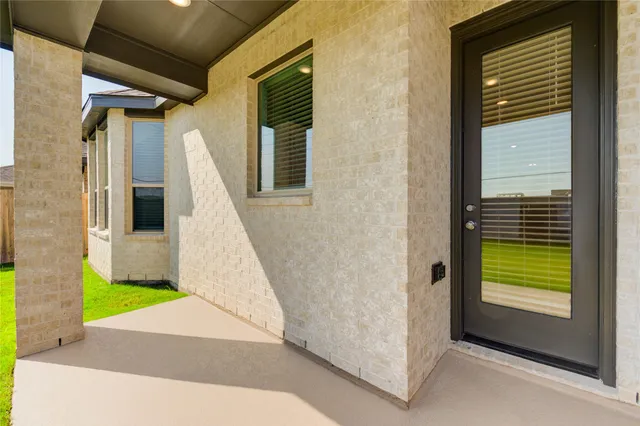a view of a bedroom with windows