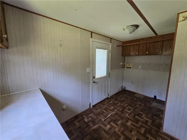 a bathroom with a glass door shower