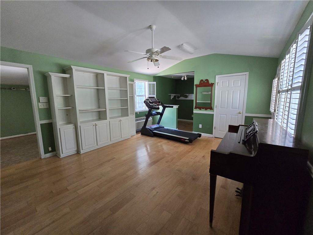1120 Fincherville Road Jackson, GA 30233 - Photo 28 of 38 a living room with furniture and a chandelier